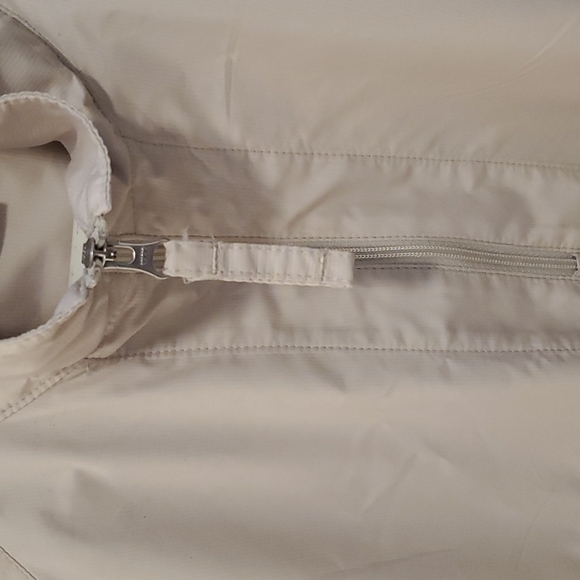 Nike golf windbreaker size medium. Color tan with white contour under arm area. - Picture 4 of 5